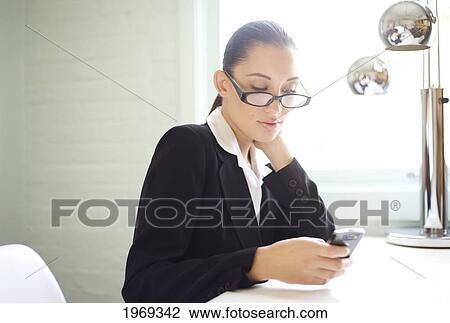 Hawaii, Oahu, Business Woman With Her Cell Phone. View Large Photo Image Stock Image - Hawaii, Oahu, Business Woman With Her Cell Phone.. Fotosearch