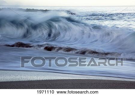 Stock Image - Hawaii, Oahu, Crashing Wave On The North Shore.. Fotosearch