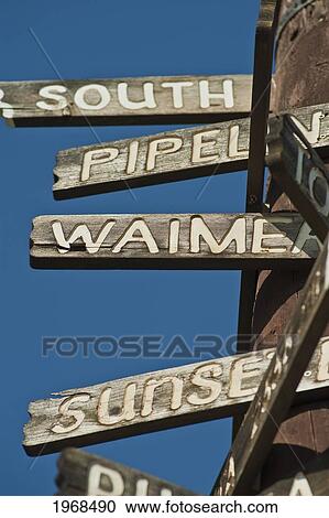 Stock Image - Hawaii, Oahu, Detail Of Sign Pole Located In Haleiwa.. Fotosearch