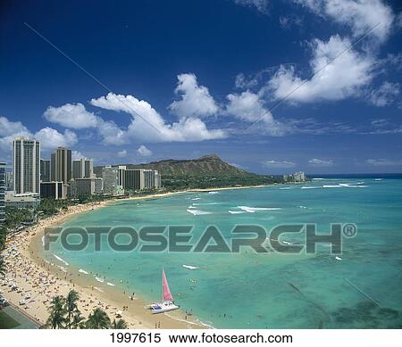 Stock Photography - Hawaii, Oahu, Diamond Head And Waikiki Beach, Pink Catamaran On Beach A43D. Fotosearch