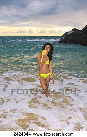 Picture - Hawaii, Oahu, Eternity Beach, Beautiful girl on the beach in the morning.. Fotosearch