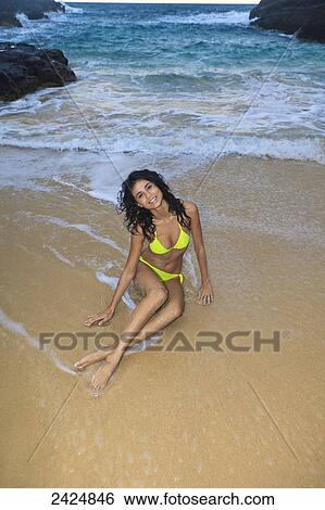 Hawaii, Oahu, Eternity Beach, Beautiful girl on the beach in the morning. View Large Photo Image Stock Photograph - Hawaii, Oahu, Eternity Beach, Beautiful girl on the beach in the morning.. Fotosearch