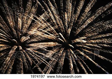 Hawaii, Oahu, Fireworks Burst In The Evening Sky. View Large Photo Image Stock Photo - Hawaii, Oahu, Fireworks Burst In The Evening Sky.. Fotosearch
