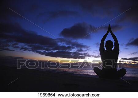 Hawaii, Oahu, Fit Young Guy On The Beach Doing Yoga On The Coastline. View Large Photo Image Picture - Hawaii, Oahu, Fit Young Guy On The Beach Doing Yoga On The Coastline.. Fotosearch