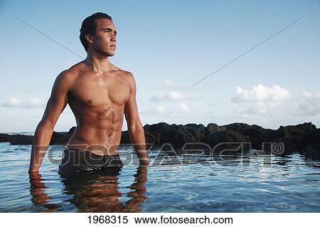 Hawaii, Oahu, Fit Young Male Enjoying A Warm Day In A Tidepool. View Large Photo Image Stock Photography - Hawaii, Oahu, Fit Young Male Enjoying A Warm Day In A Tidepool.. Fotosearch