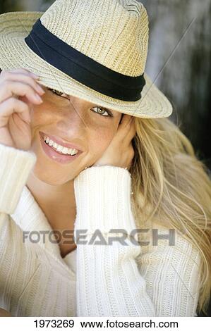 Hawaii, Oahu, Headshot Of A Beautiful Woman Wearing A Hat. View Large Photo Image Stock Photo - Hawaii, Oahu, Headshot Of A Beautiful Woman Wearing A Hat.. Fotosearch