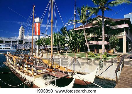 Stock Image - Hawaii, Oahu, Hokulea Docked At Hawaii Maritime Center. No Commercial Use. Fotosearch