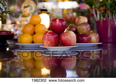 Hawaii, Oahu, Honolulu, Close-up of offerings of fruit that adorn the oldest Chinese temple View Large Photo Image Stock Image - Hawaii, Oahu, Honolulu, Close-up of offerings of fruit that adorn the oldest Chinese temple. Fotosearch