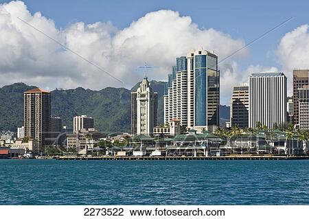 Stock Image - Hawaii, Oahu, Honolulu Harbor, Aloha Tower And Office Buildings.. Fotosearch