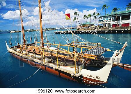 Stock Image - Hawaii, Oahu, Honolulu, Hawaiian Sailing Canoe, Hokule'a Closeup Side View, Anchored Off Aloha Tower No Commercial Use. Fotosearch