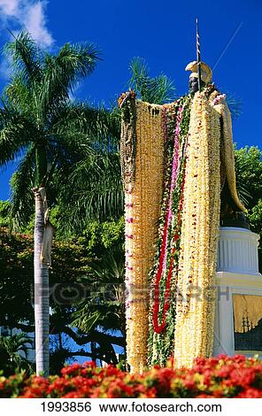 Stock Photograph - Hawaii, Oahu, Honolulu, King Kamehameha Statue Draped With Leis. Fotosearch