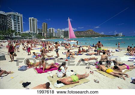Stock Photo - Hawaii, Oahu, Honolulu, Waikiki Beach With Crowds Of People Diamond Head Background A42C. Fotosearch