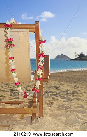 Hawaii, Oahu, Kailua, A lounge chair on the white sandy beach of Lanikai. View Large Photo Image Stock Photo - Hawaii, Oahu, Kailua, A lounge chair on the white sandy beach of Lanikai.. Fotosearch