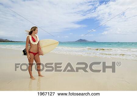Hawaii, Oahu, Kailua Beach, Teenage Girl Holding Surfboard On Beach. View Large Photo Image Stock Photo - Hawaii, Oahu, Kailua Beach, Teenage Girl Holding Surfboard On Beach.. Fotosearch