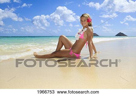 Stock Image - Hawaii, Oahu, Kailua, Lanikai Beach, Teenage Girl On Beach.. Fotosearch