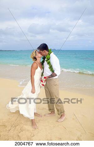 Stock Photo - Hawaii, Oahu, Kailua, Lanikai Beach, Attractive Newlywed Couple On Beach.. Fotosearch