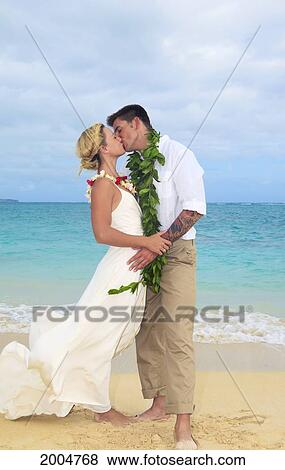 Stock Photo - Hawaii, Oahu, Kailua, Lanikai Beach, Attractive Newlywed Couple On Beach.. Fotosearch