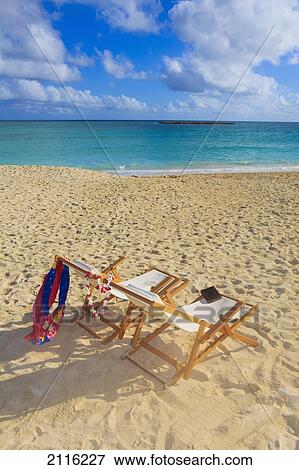 Hawaii, Oahu, Kailua, Two lounge chairs on the white sandy beach of Lanikai. View Large Photo Image Stock Photo - Hawaii, Oahu, Kailua, Two lounge chairs on the white sandy beach of Lanikai.. Fotosearch