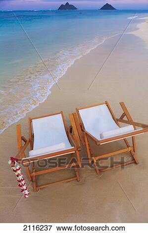 Hawaii, Oahu, Kailua, Two lounge chairs on the white sandy beach of Lanikai. View Large Photo Image Stock Photo - Hawaii, Oahu, Kailua, Two lounge chairs on the white sandy beach of Lanikai.. Fotosearch