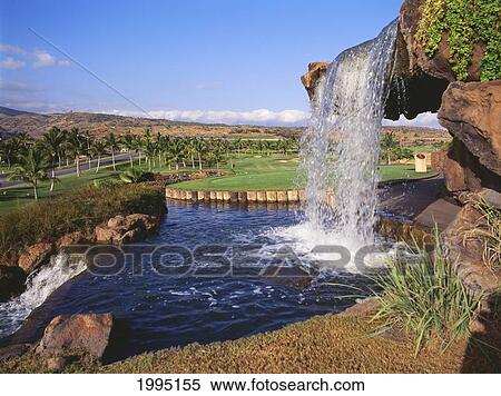 Stock Photography - Hawaii, Oahu, Kapolei, Ko Olina Golf Club, Manmade Waterfall.. Fotosearch