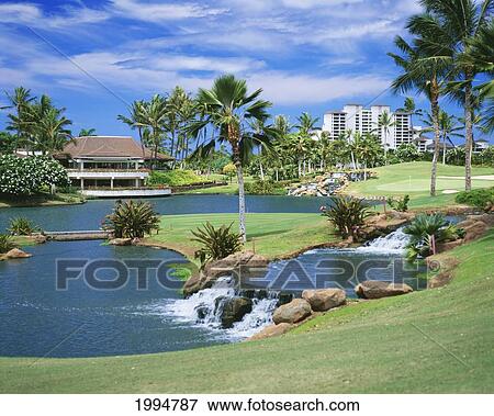 Hawaii, Oahu, Ko'olina Golf Club, 18Th Hole, Lake And Small Rapids. View Large Photo Image Stock Photo - Hawaii, Oahu, Ko'olina Golf Club, 18Th Hole, Lake And Small Rapids.. Fotosearch
