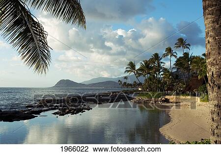 Stock Image - Hawaii, Oahu, Koolina, Paradise Cove On The West Side Of Oahu.. Fotosearch