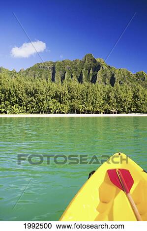 Stock Image - Hawaii, Oahu, Kualoa Mountainas, View From Kayak In Ocean. Fotosearch