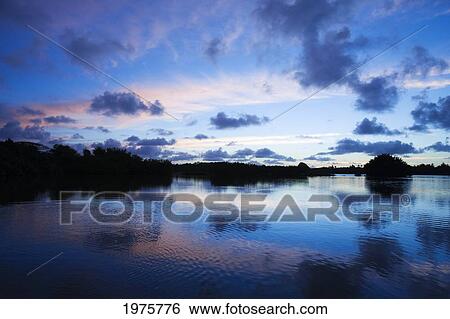 Hawaii, Oahu, Kualoa Ranch Fish Pond At Sunrise. View Large Photo Image Stock Photograph - Hawaii, Oahu, Kualoa Ranch Fish Pond At Sunrise.. Fotosearch