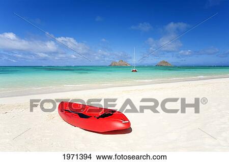 Picture - Hawaii, Oahu, Lanikai Beach, Red Kayak On Sandy Shore, Mokulua Islands In Distance.. Fotosearch