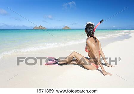 Hawaii, Oahu, Lanikai Beach, Woman Sitting On Beach Wearing Snorkel Gear. View Large Photo Image Stock Photo - Hawaii, Oahu, Lanikai Beach, Woman Sitting On Beach Wearing Snorkel Gear.. Fotosearch