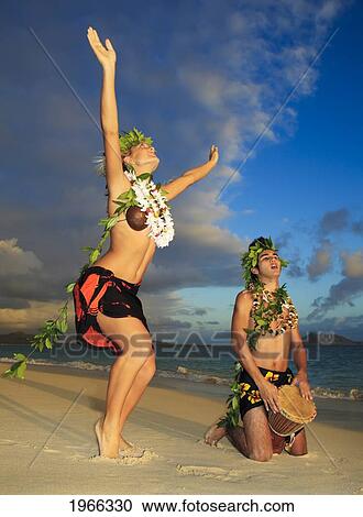 Hawaii, Oahu, Lanikai Beach, Young Couple Dancing Hula On Beach, Sunrise Light. View Large Photo Image Stock Image - Hawaii, Oahu, Lanikai Beach, Young Couple Dancing Hula On Beach, Sunrise Light.. Fotosearch