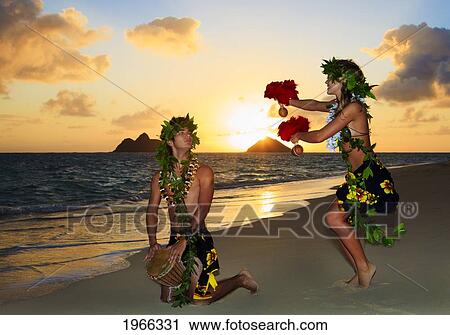 Hawaii, Oahu, Lanikai Beach, Young Couple Dancing Hula On Beach, Sunrise Over Mokulua Islands. View Large Photo Image Stock Image - Hawaii, Oahu, Lanikai Beach, Young Couple Dancing Hula On Beach, Sunrise Over Mokulua Islands.. Fotosearch