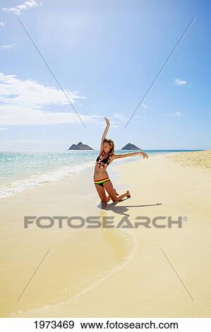 Stock Photo - Hawaii, Oahu, Lanikai, Beautiful Girl Enjoying A Day Out.. Fotosearch