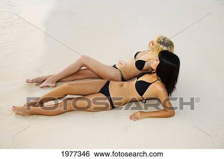 Hawaii, Oahu, Lanikai, Beautiful Girls On The Beach. View Large Photo Image Stock Photograph - Hawaii, Oahu, Lanikai, Beautiful Girls On The Beach.. Fotosearch