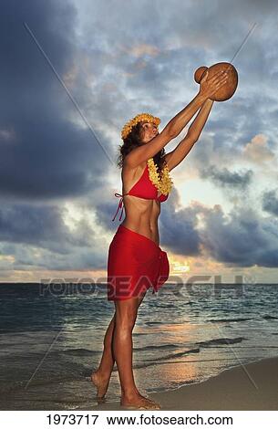 Stock Photo - Hawaii, Oahu, Lanikai, Beautiful Hawaiian Woman Dancing Hula On Ocean Shoreline.. Fotosearch