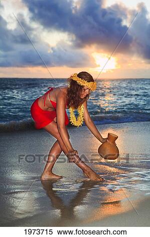 Stock Photography - Hawaii, Oahu, Lanikai, Beautiful Hawaiian Woman Dancing Hula On Ocean Shoreline.. Fotosearch