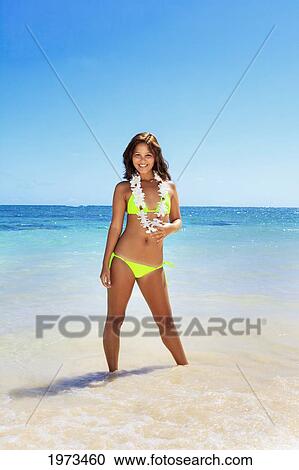 Stock Image - Hawaii, Oahu, Lanikai, Beautiful Woman On The Beach.. Fotosearch