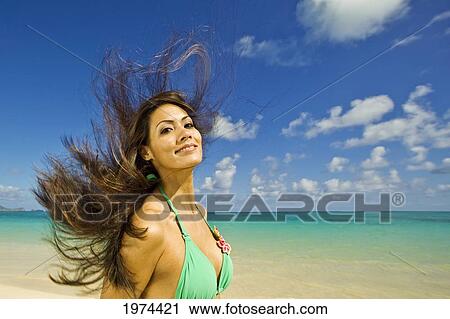 Hawaii, Oahu, Lanikai, Beautiful Woman Jumping In The Air. View Large Photo Image Stock Image - Hawaii, Oahu, Lanikai, Beautiful Woman Jumping In The Air.. Fotosearch