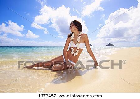 Stock Photo - Hawaii, Oahu, Lanikai, Beautiful Woman On The Beach.. Fotosearch