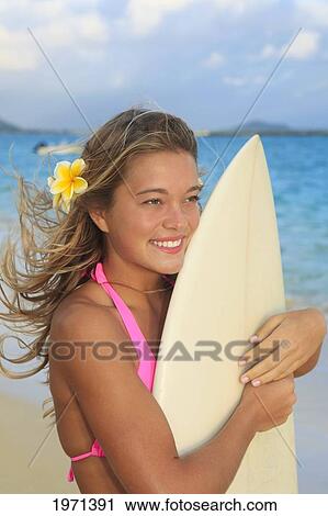 Hawaii, Oahu, Lanikai, Blond Surfer Girl With Surfboard Along Beach. View Large Photo Image Stock Image - Hawaii, Oahu, Lanikai, Blond Surfer Girl With Surfboard Along Beach.. Fotosearch