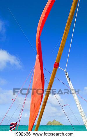 Stock Photograph - Hawaii, Oahu, Lanikai, Close-Up Of Sailboat Rigging With Blue Sky And Turquoise Ocean. Fotosearch