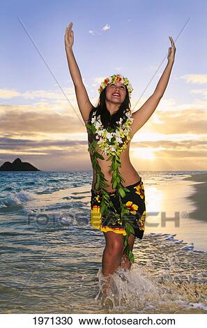 Hawaii, Oahu, Lanikai, Female Hula Dancer Along Beach Shoreline At Sunrise. View Large Photo Image Stock Image - Hawaii, Oahu, Lanikai, Female Hula Dancer Along Beach Shoreline At Sunrise.. Fotosearch