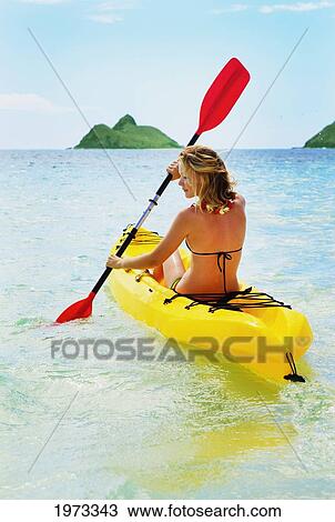 Stock Image - Hawaii, Oahu, Lanikai =, Female Kayaker Enjoying A Day On The Water.. Fotosearch