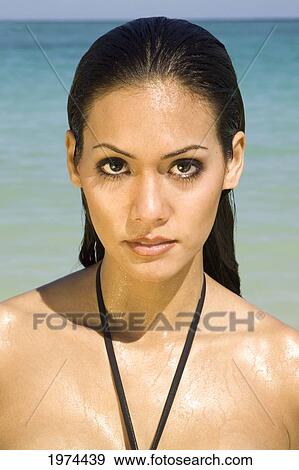 Stock Photo - Hawaii, Oahu, Lanikai, Headshot Of Attractive Young Woman.. Fotosearch
