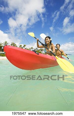 Stock Photo - Hawaii, Oahu, Lanikai, Japanese Couple Kayaking In The Ocean.. Fotosearch