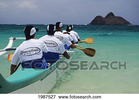Hawaii, Oahu, Lanikai, Lanikai Canoe Club, Men Paddling Towards Island, View From Behind. No Model Release View Large Photo Image Stock Photo - Hawaii, Oahu, Lanikai, Lanikai Canoe Club, Men Paddling Towards Island, View From Behind. No Model Release. Fotosearch