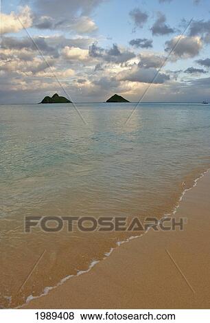 Stock Photo - Hawaii, Oahu, Lanikai, Late Afternoon View Of The Mokulua Islands.. Fotosearch