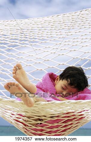 Hawaii, Oahu, Lanikai, Little Boy Sleeping A Hammock. View Large Photo Image Stock Photo - Hawaii, Oahu, Lanikai, Little Boy Sleeping A Hammock.. Fotosearch