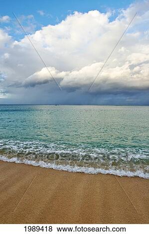 Hawaii, Oahu, Lanikai, Ocean And Clouds Over A Sandy Beach. View Large Photo Image Stock Photo - Hawaii, Oahu, Lanikai, Ocean And Clouds Over A Sandy Beach.. Fotosearch