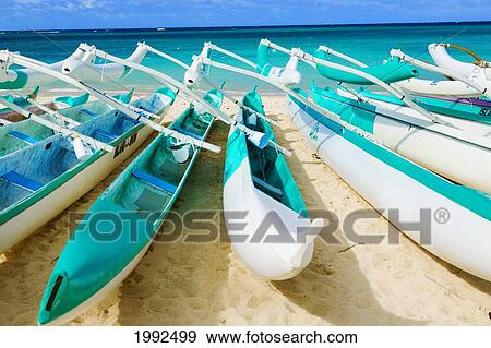 Hawaii, Oahu, Lanikai, Outrigger Canoes Stacked Along The Beach View Large Photo Image Stock Photo - Hawaii, Oahu, Lanikai, Outrigger Canoes Stacked Along The Beach. Fotosearch